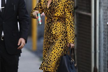 Katy Perry flaunts her wild side in yellow cheetah print jacket and snakeskin leggings at Jimmy Kimmel Live!