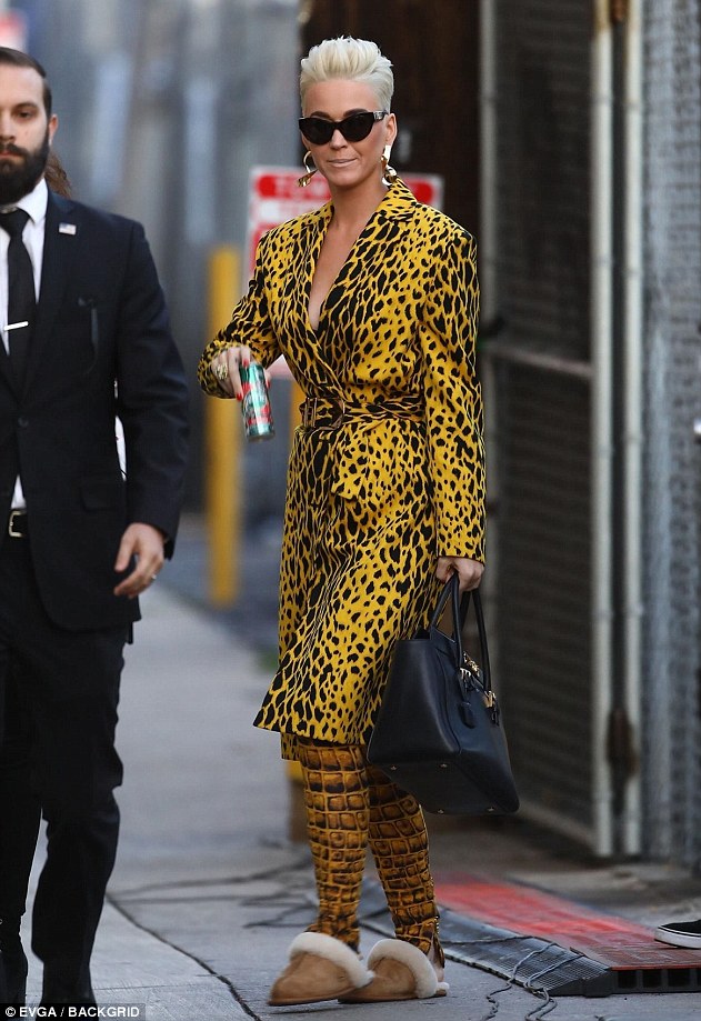 Katy Perry flaunts her wild side in yellow cheetah print jacket and snakeskin leggings at Jimmy Kimmel Live!